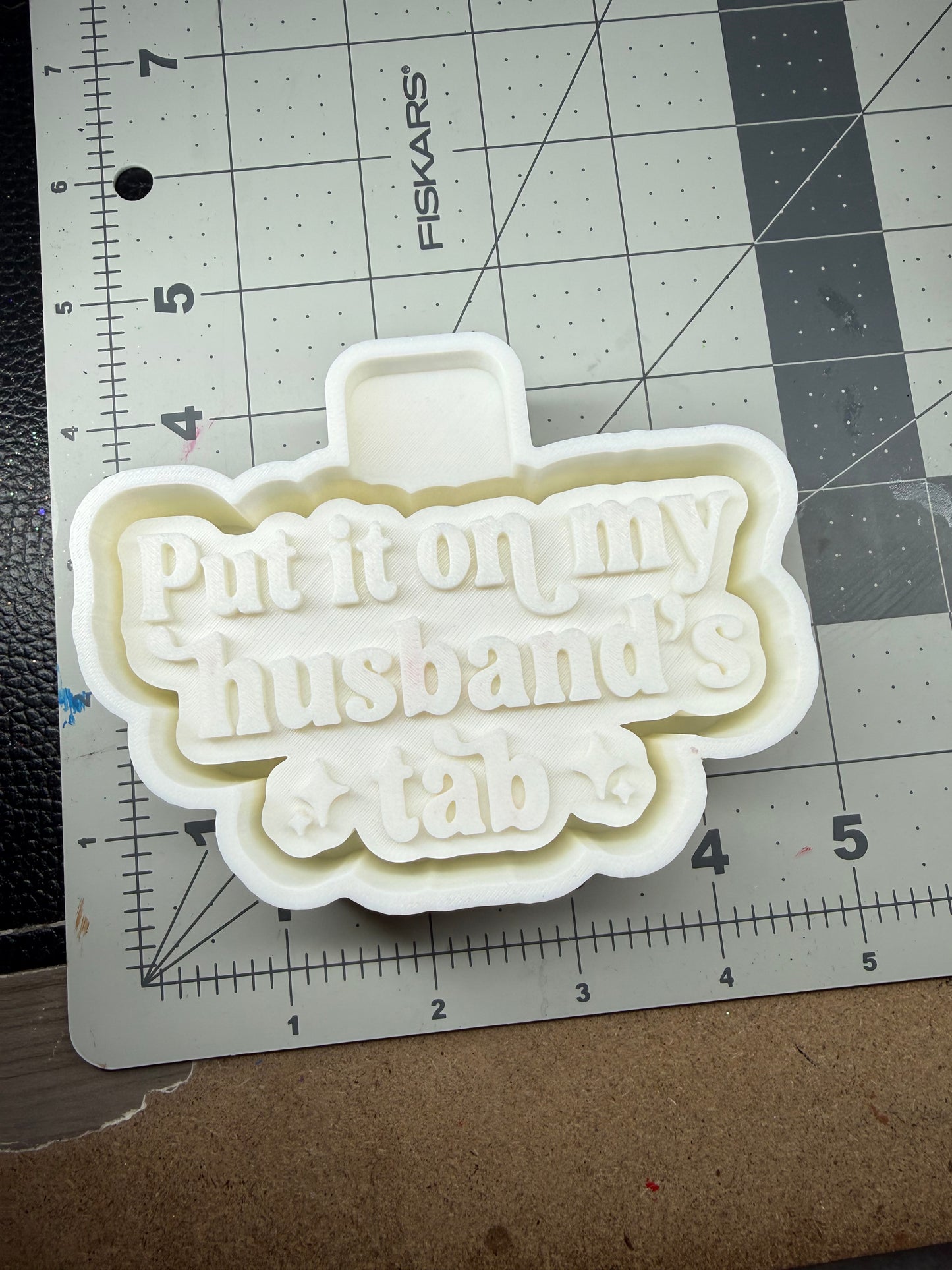 Put it on my husbands tab silicone mold for car freshies